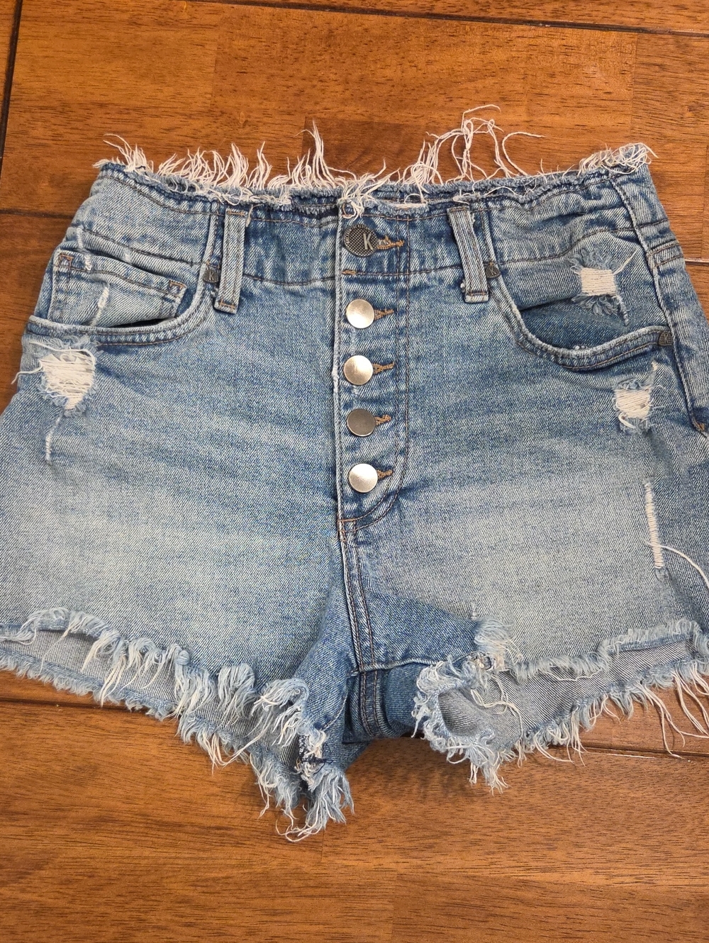 High-Rise Distressed Light Blue Denim Shorts - Women